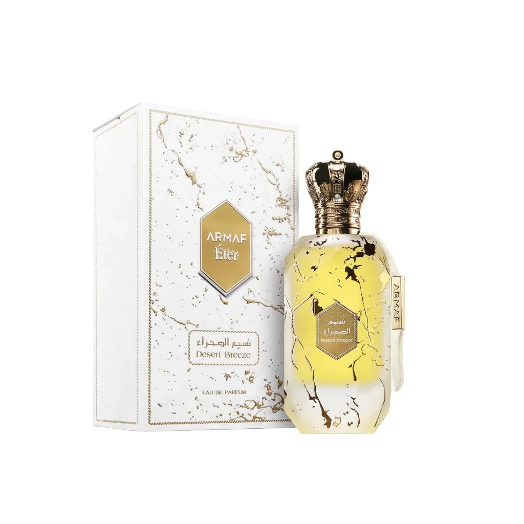 Armaf Éter Desert Breeze Eau de Parfum — frasco y caja de lujo en blanco mármol con detalles dorados